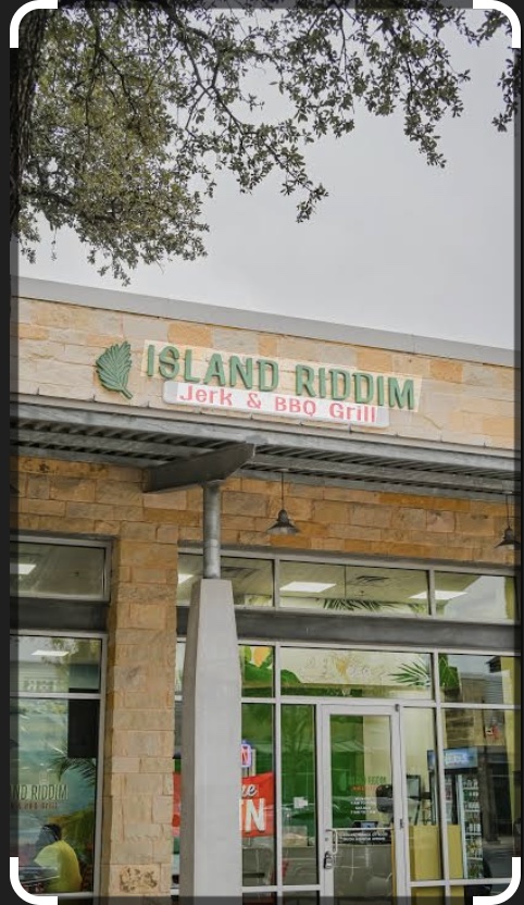Island Riddim Jerk & BBQ Grill storefront at 200 University Blvd Suite 350 in Round Rock, Texas — commercial lease with tenant representation by Hannah Mara